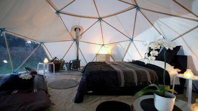 These stylish geodesic tents perched on the edge of Bodmin Moor feature large clear windows from which to view the unpolluted Cornish night sky. Surrounded by a little more than a hectare of wild flower meadows, the pods, as they are known, are conjoined ???