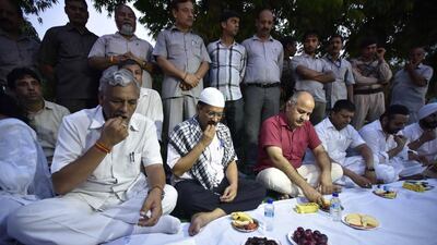 Delhi chief minister Arvind Kejriwal and deputy chief minister Manish Sisodia, and other members of their Aam Aadmi Party, host an iftar event in New Delhi on June 26, 2016. Arun Sharma / Hindustan Times via Getty Images