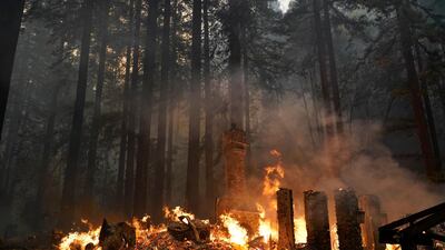A home is burned to the ground by the CZU August Lightning Complex Fire in Ben Lomond, California. AP Photo