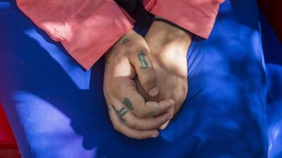 Morrocan teenager Khadija , sits at a park near the tribunal of the Morroccan city of Beni Mellal, after her court hearing on October 10, 2018. AFP