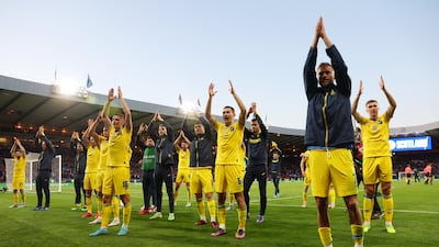 Ukraine players applaud their fans after their 3-1 win against Scotland in the World Cup qualifier at Hampden Park in Glasgow, Scotland. Getty