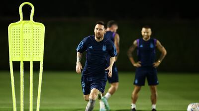 Lionel Messi runs during the training session. Getty