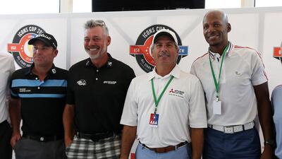 Darren Clarke, centre left, alongside opposing captain Fred Couples, centre right, former basketball player Ray Allen, right, and former cricketer Shane Warne, left. Pawan Singh / The National