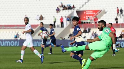 Saudi Arabia goalkeeper Mohammed Al-Owais clears the ball. AFP