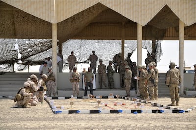 Another photo showing expatriates facilitate a briefing of UAE and US personnel for a training exercise at a combat training centre in Abu Dhabi Emirate Photo: Dr Athol Yates