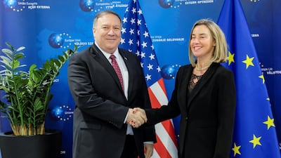 US Secretary of State Mike Pompeo poses with European Union foreign policy chief Federica Mogherini in Brussels. Reuters