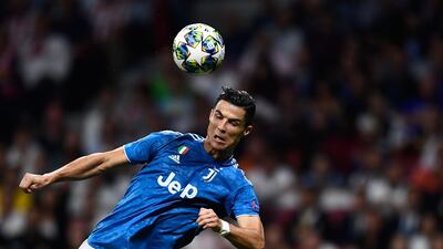 Juventus' Portuguese forward Cristiano Ronaldo heads the ball. AFP