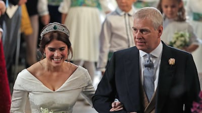 Princess Eugenie walks down the aisle with her father for her wedding to Jack Brooksbank at St George's Chapel, Windsor Castle, in 2018