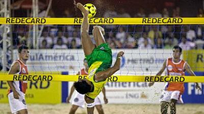 Brazil's Anderson kicks the ball during a Footvolley match with Paraguay at Rio de Janeiro, Brazil, in March.