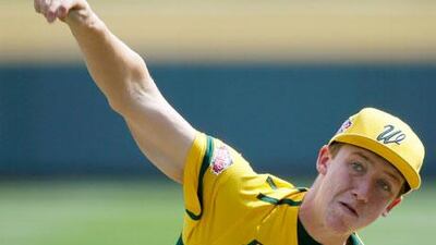 Grant Holman is the tallest player in the World Series. Matt Slocum / AP Photo