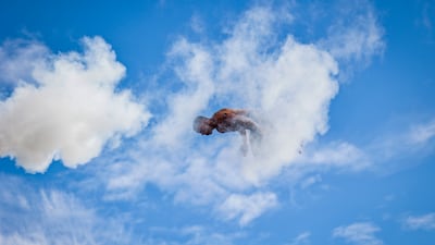 A competitor launches himself from a 12-metre platform during the World Championship in Death Diving in Arendal, Norway. EPA
