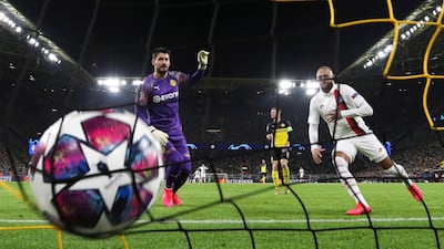 Paris Saint-Germain forward Neymar scores against Borussia Dortmund in the Champions League last-16 first-leg game in Germany on Tuesday, February 18. Dortmund won the game 2-1. EPA