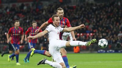 Tottenham's Harry Kane volleys towards goal. Julian Finney / Getty Images
