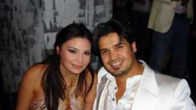 Riyadh Alazzawi says he and Suzan Tamim led a quiet life in London out of concern for her safety. An Egyptian tycoon is charged with hiring a hitman to kill her.