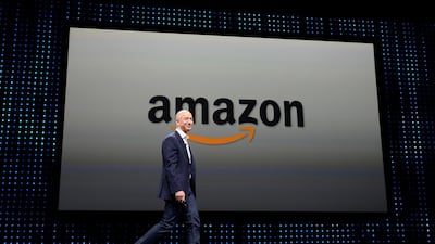 Amazon CEO Jeff Bezos seen walking on stage at a press conference where he introduced new Kindle products at Santa Monica Airport in California in September 2012. EPA