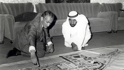 Dr Abdulrahman Makhlouf and Sheikh Zayed in 1974, planning how Abu Dhabi should look as it develops from a small coastal settlement into the UAE capital. Photo: Courtesy National Centre for Documentation and Research