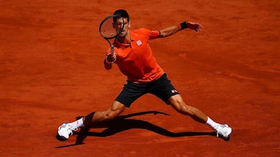 Novak Djokovic returns a shot to Andy Murrya dring his semi-final win at the French Open. Dan Istitene / Getty Images / June 6, 2015