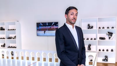 Sofiane Si Merabet with his work 'My Parents Have Never Been to the Ice Rink'. Victor Besa / The National