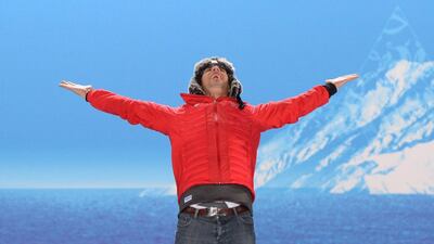 A picture taken with a robotic camera shows Switzerland's gold medalist Sandro Viletta posing during the men's alpine skiing super combined medal ceremony at the Sochi medals plaza on Saturday. Antonin Thuillier / AFP