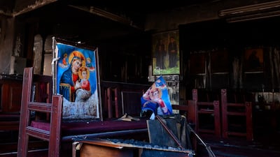 The fire-damaged church interior. AP