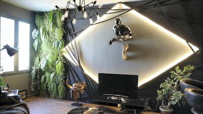 A flat wall is given a three-dimensional effect in the Hassan household in International City. Pawan Singh / The National