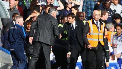 Crystal Palace manager Sam Allardyce, left, and Chelsea manager Antonio Conte shake hands after Palace's surprise 2-1 Premier League victory over Chelsea on Saturday. Ian Walton / Getty Images