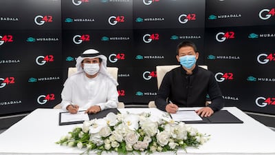 Musabbeh Al Kaabi (left), chief executive of UAE Investments at Mubadala, and Peng Xiao, group chief executive of G42, during the signing of the pact to establish a biopharmaceutical manufacturing campus in Abu Dhabi. Photo: G42