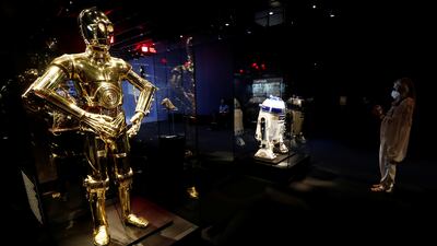 A C-3PO suit and a R2-D2 remote controlled unit. Reuters