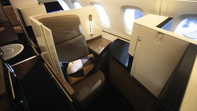 The First Suite on the Etihad Airways' Boeing 787-9, which offers guests an enhanced suite with chilled mini-bar, complete privacy and centre seats which can be joined to create a double bed. Lee Hoagland / The National
