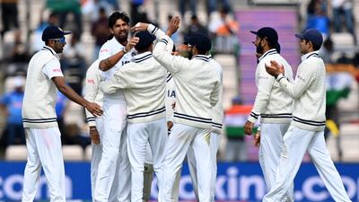 India players celebrate the wicket of New Zealand captain Kane Williamson. AFP