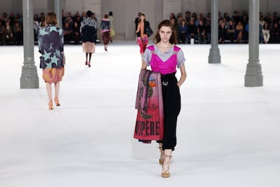 Julian Klausner layers eveningwear over everyday staples, finding glamour in unexpected combinations. Reuters