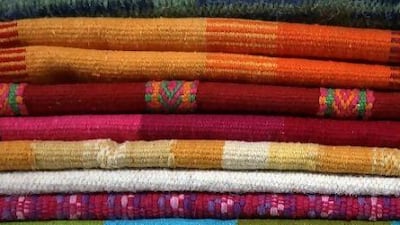 Handwoven fabrics on sale at the Dubai Fabindia. Amy Leang / The National
