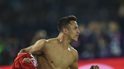 Chile's Alexis Sanchez celebrates after scoring the winning spot kick against Argentina in the Copa America final on Saturday. Rodrigo Arangua / AFP