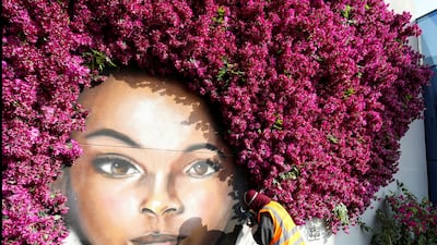 Saudi Mural Artist, Noura Bint Saidan puts final touches to her art, on the Boulevard as part of the "Riyadh Season" in Riyadh, Saudi Arabia November 23. Reuters