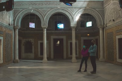 Visitors look up at Oussama Menchaoui's Seeing Through Sounds. Courtesy Nizar Messaoud