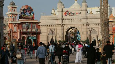 Visitors at DXB Entertainment Bollywood theme park. The company has narrowed its yearly loss to Dh1bn as visitor numbers climbed. AP Photo