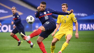 Kylian Mbappe fails to connect with a shot. AFP