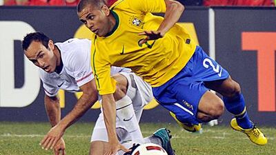 Brazil’s Dani Alves, right, is expected to be play when his team meet Iran next week. Ray Stubblebine / Reuters