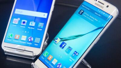 The new Galaxy smartphones in all their glory. Bebeto Matthews / AP Photo