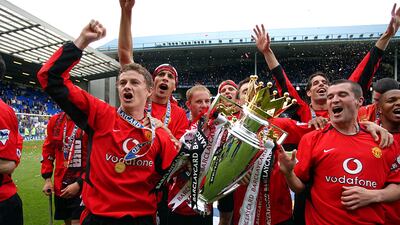 Ole Gunnar Solskjaer and Roy Keane celebrate with the Premier League trophy in 2002-3, when 83 points was enough for the title. Getty