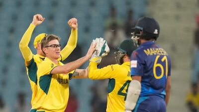 Australia's Adam Zampa celebrates the wicket of Sri Lanka's Maheesh Theekshana, right. AP