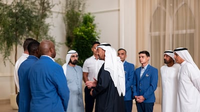 Sheikh Mohamed speaks with flydubai crew members, with Sheikh Mohammed bin Rashid, Ghaith Al Ghaith, chief executive of flydubai, and Sheikh Ahmed bin Saeed, president of the Department of Civil Aviation, chairman and chief executive of Emirates and chairman of Dubai World