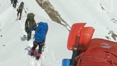 Footage has been released showing the final moments of a team of climbers who vanished while climbing a Himalayan peak. AFP