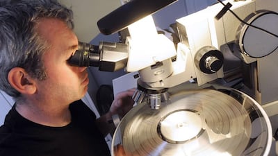 Old-school technology like vinyl records are appealing to a young audience who never experienced them first time around. Photo: Francois Monier / AFP