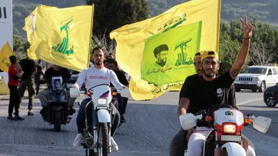 Supporters of Lebanon's Hezbollah parade in Kfar Kila village near the border with Israel in southern Lebanon. Reuters