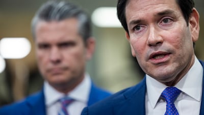 US Secretary of State Marco Rubio, right, alongside Secretary of Defence Pete Hegseth, speaks to reporters on Wednesday. EPA