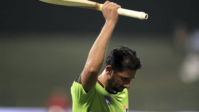 Lahore's Sohail Akhtar celebrates reaching 100 in the game between Lahore Qalandars and Yorkshire in the Abu Dhabi T20 competition at Zayed Cricket Stadium, Abu Dhabi. Photos by Chris Whiteoak / The National