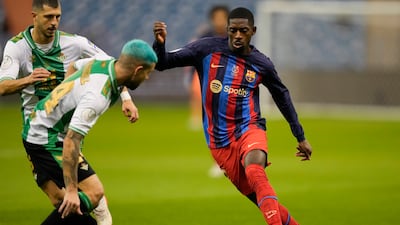 Ousmane Dembele 7 - Three dribbles brought the game to life. Set Lewandowski up for the opener. AP