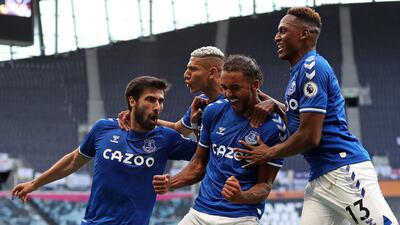 Everton striker Dominic Calvert-Lewin, centre, celebrates with teammates after scoring. AFP