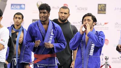 Team members of Dhafra Club cheering for their team during the Jiu-Jitsu President’s Cup Round -1 held at Al Jazira Club Indoor stadium in Abu Dhabi. Pawan Singh / The National